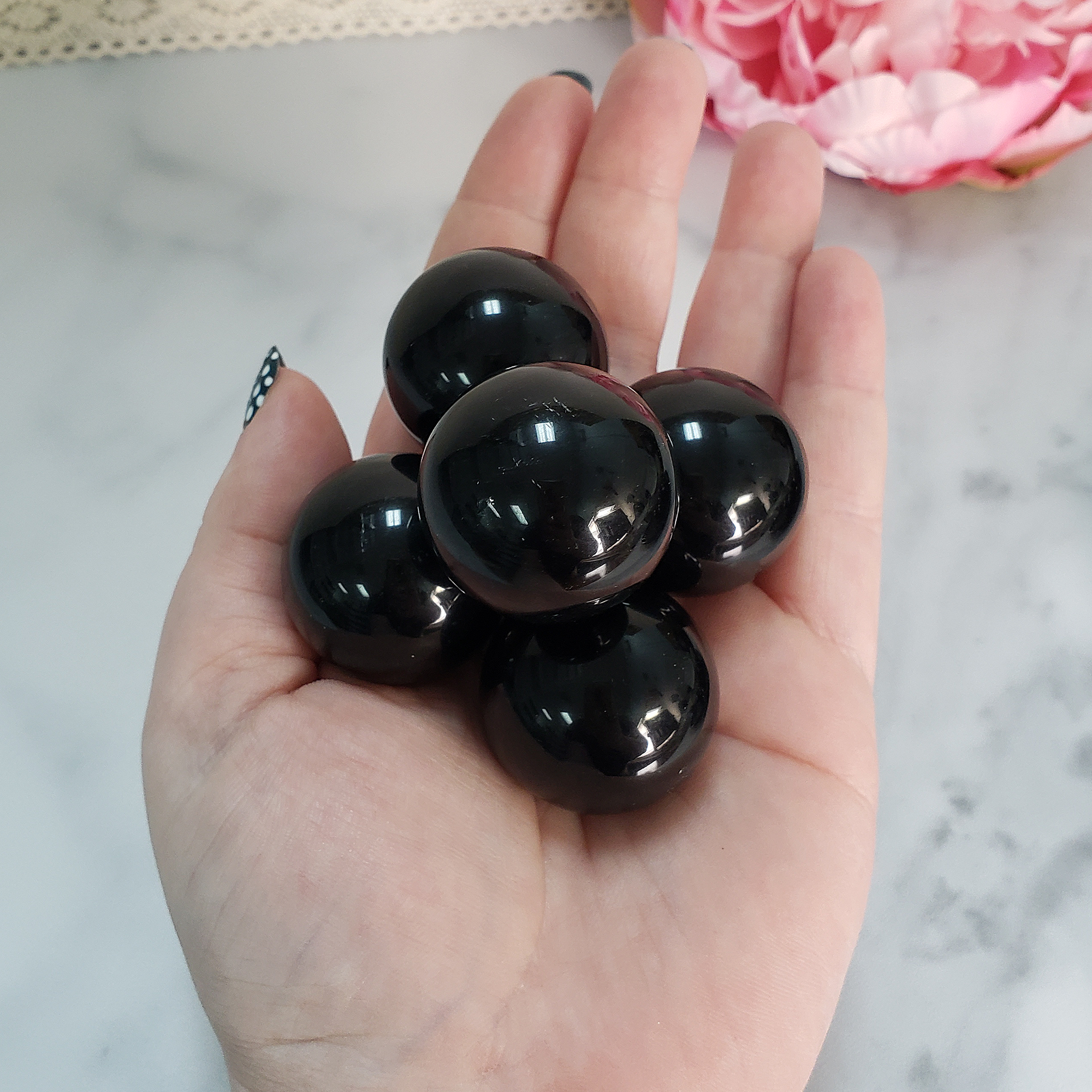 Black Obsidian Natural Crystal Sphere Gemstone Orb Marble - One 30mm Sphere - Group of Black Obsidian Crystal Orbs on Palm