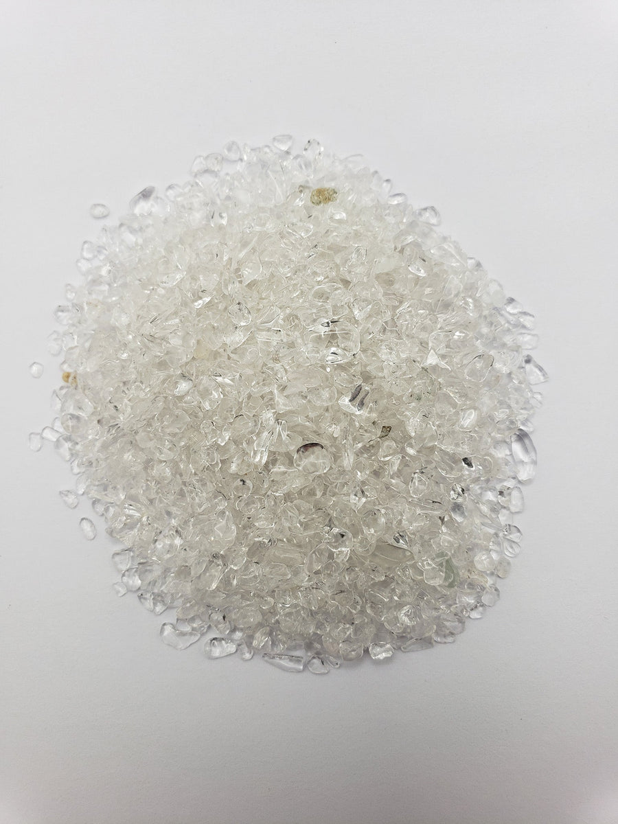 one ounce of quartz crystal chips on white background