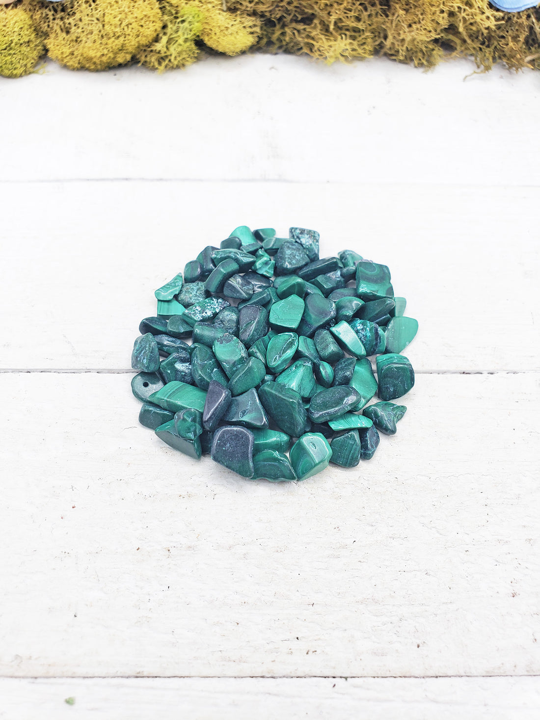 malachite crystal chips on display