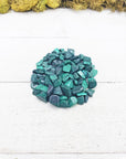 malachite crystal chips on display