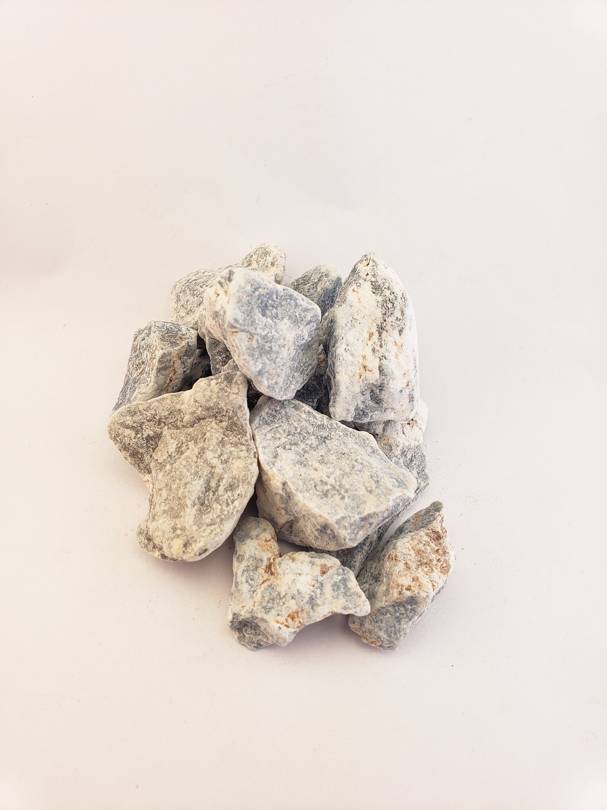 rough angelite stones in white background