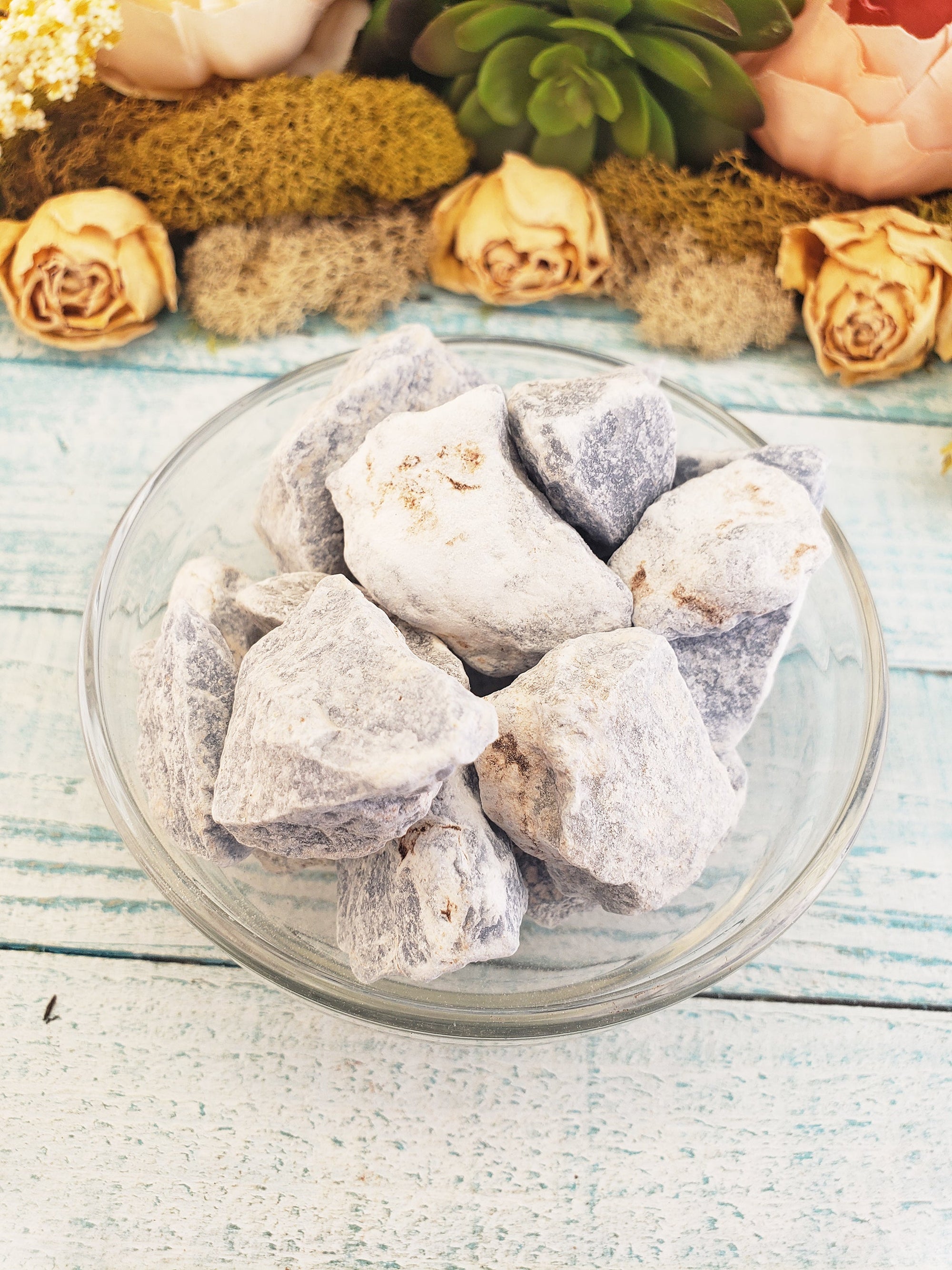 rough angelite stones in glass bowl