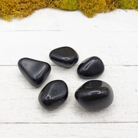 black agate stones on board