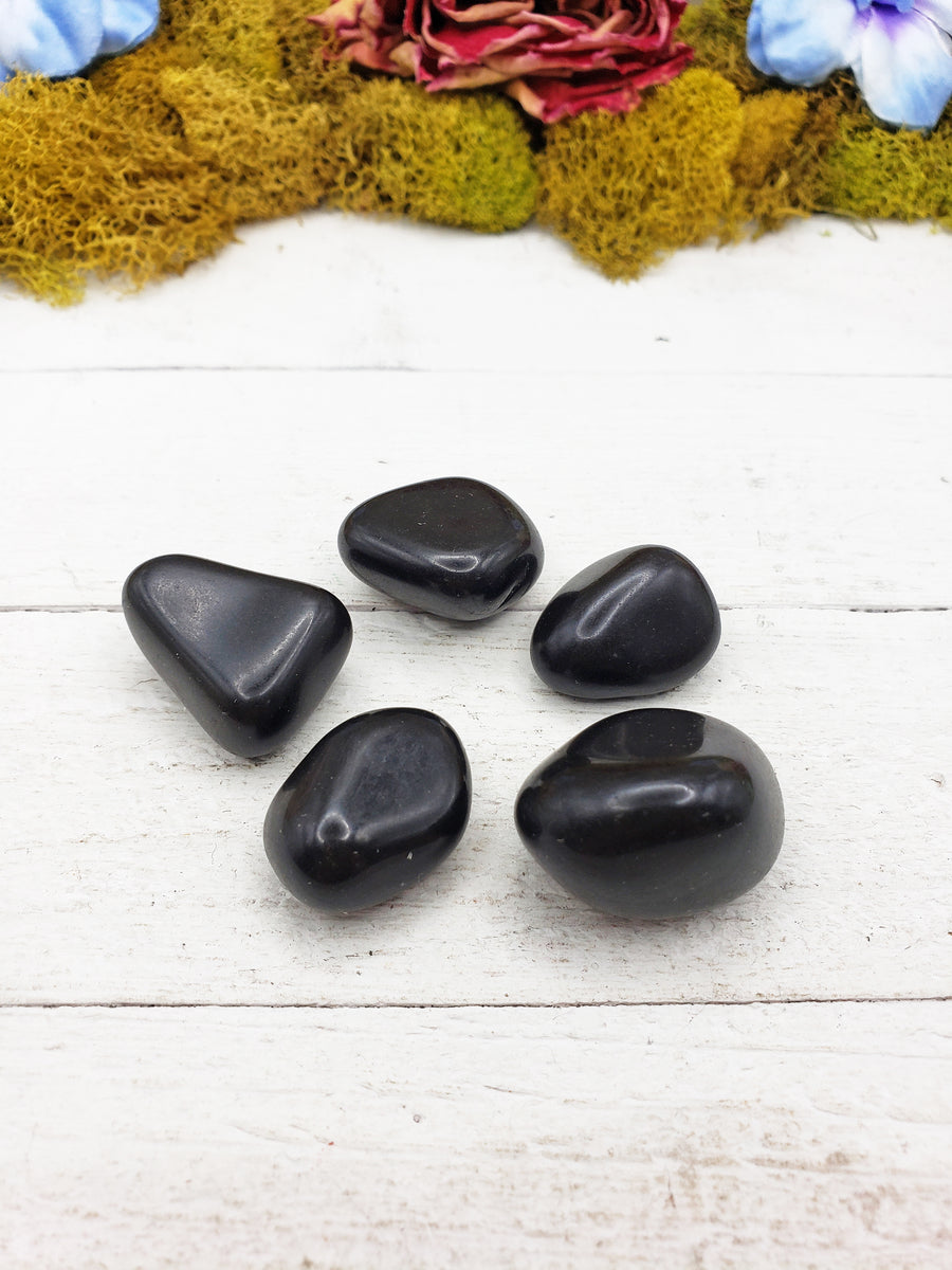 black agate stones on board