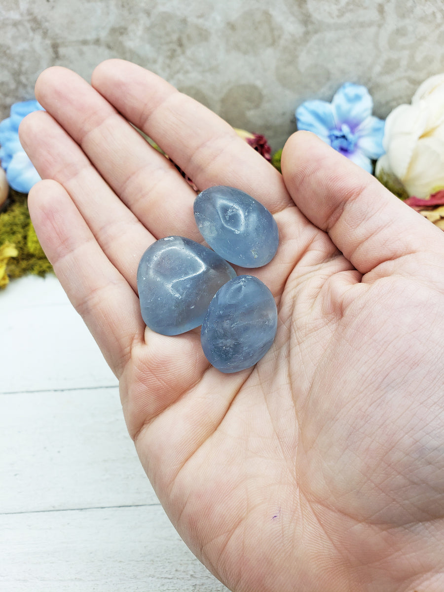celestite stones in hand