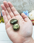 chalcopyrite stones in hand
