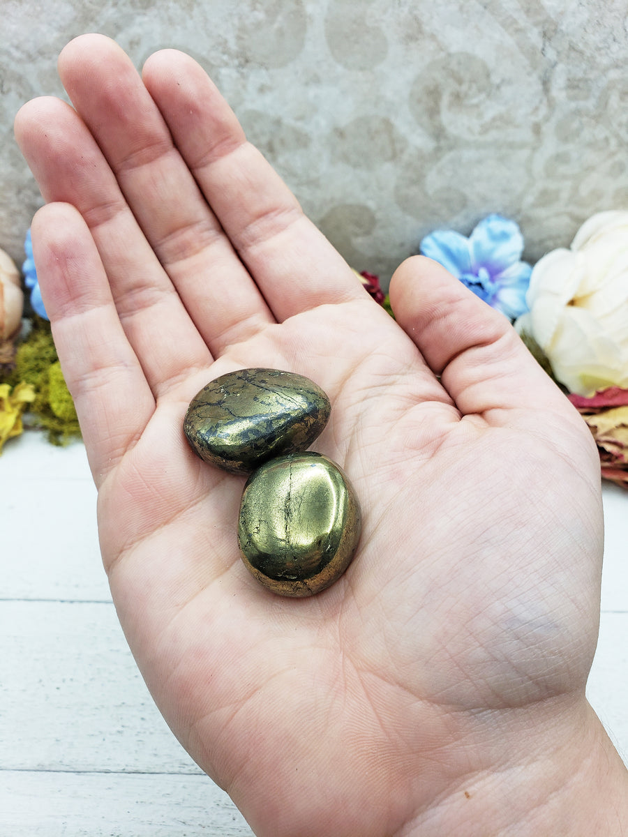 chalcopyrite stones in hand