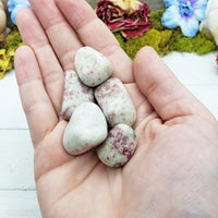 Cinnabarite stones in hand