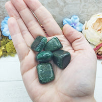 fuchsite crystals in hand