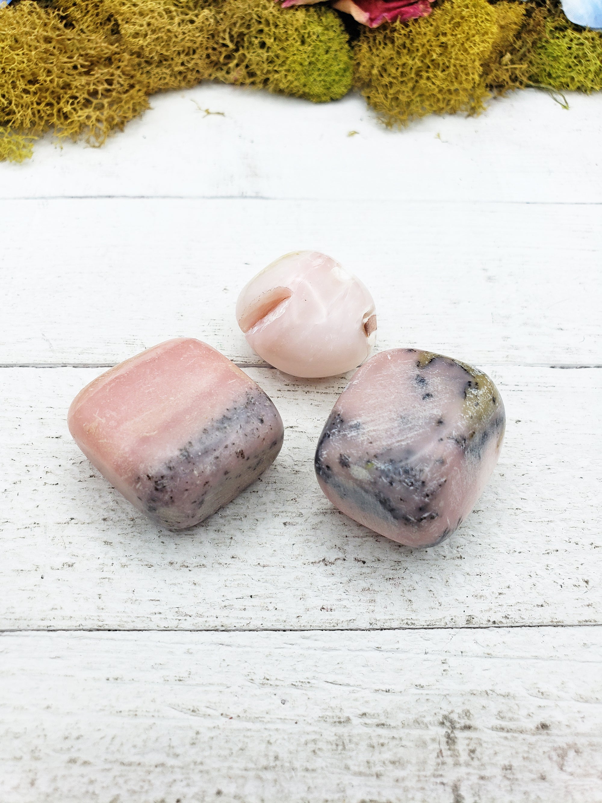 Pink Opal stones on board