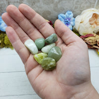 new jade stones in hand