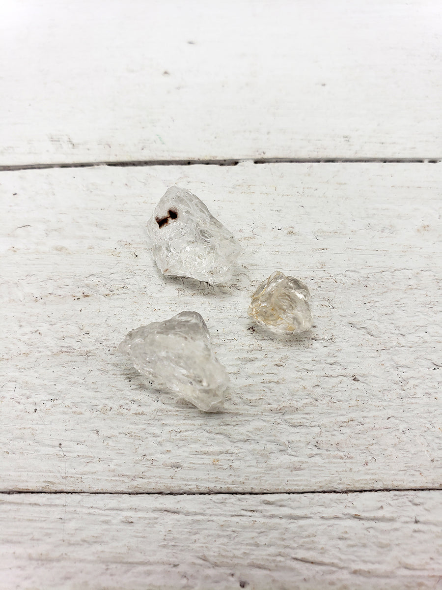 hyalite pieces on white board
