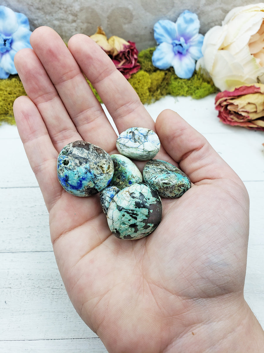 azurite malachite stones in hand
