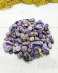 charoite stones on board
