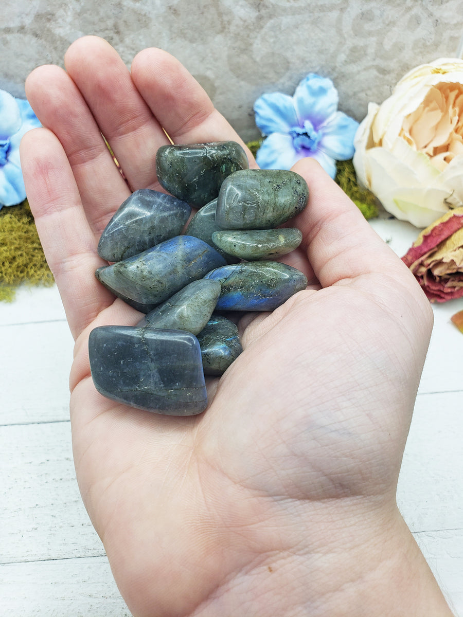 labradorite stones in hand