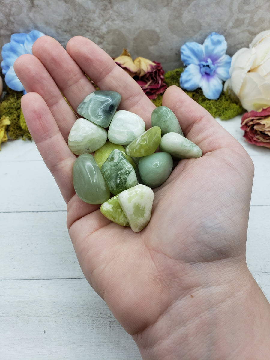 new jade stones in hand