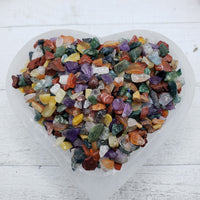 Five ounces of mixed gemstone crystal chips in selenite bowl