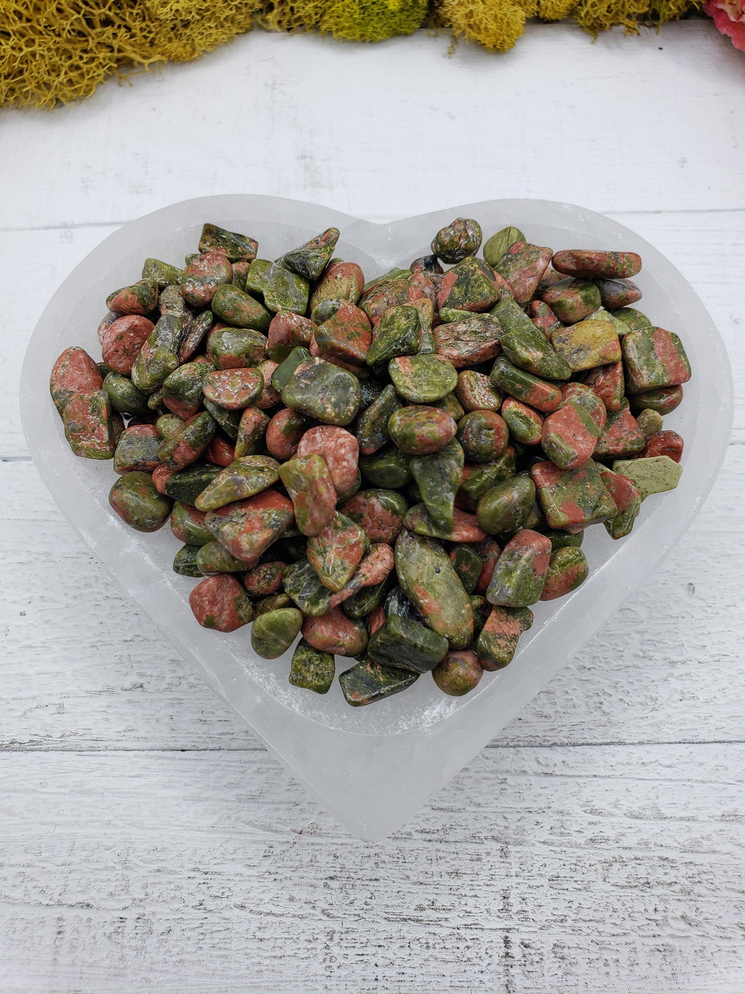 5 ounces of unakite chips in selenite bowl