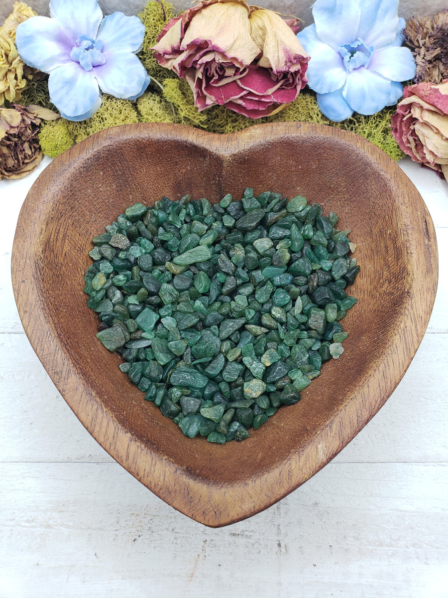 emerald crystal chips in heart-shaped bowl