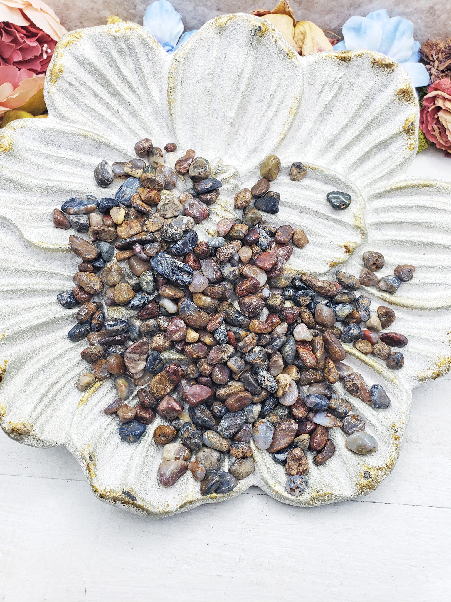 pietersite crystal chips on flower dish