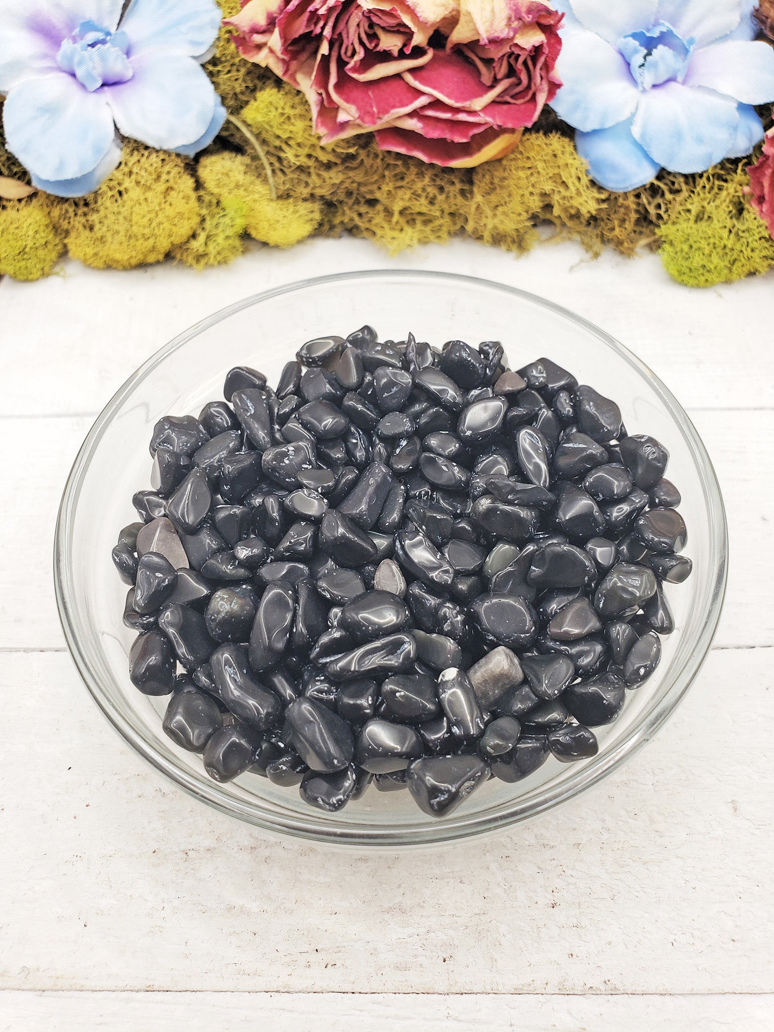 rainbow obsidian crystal chips in glass bowl