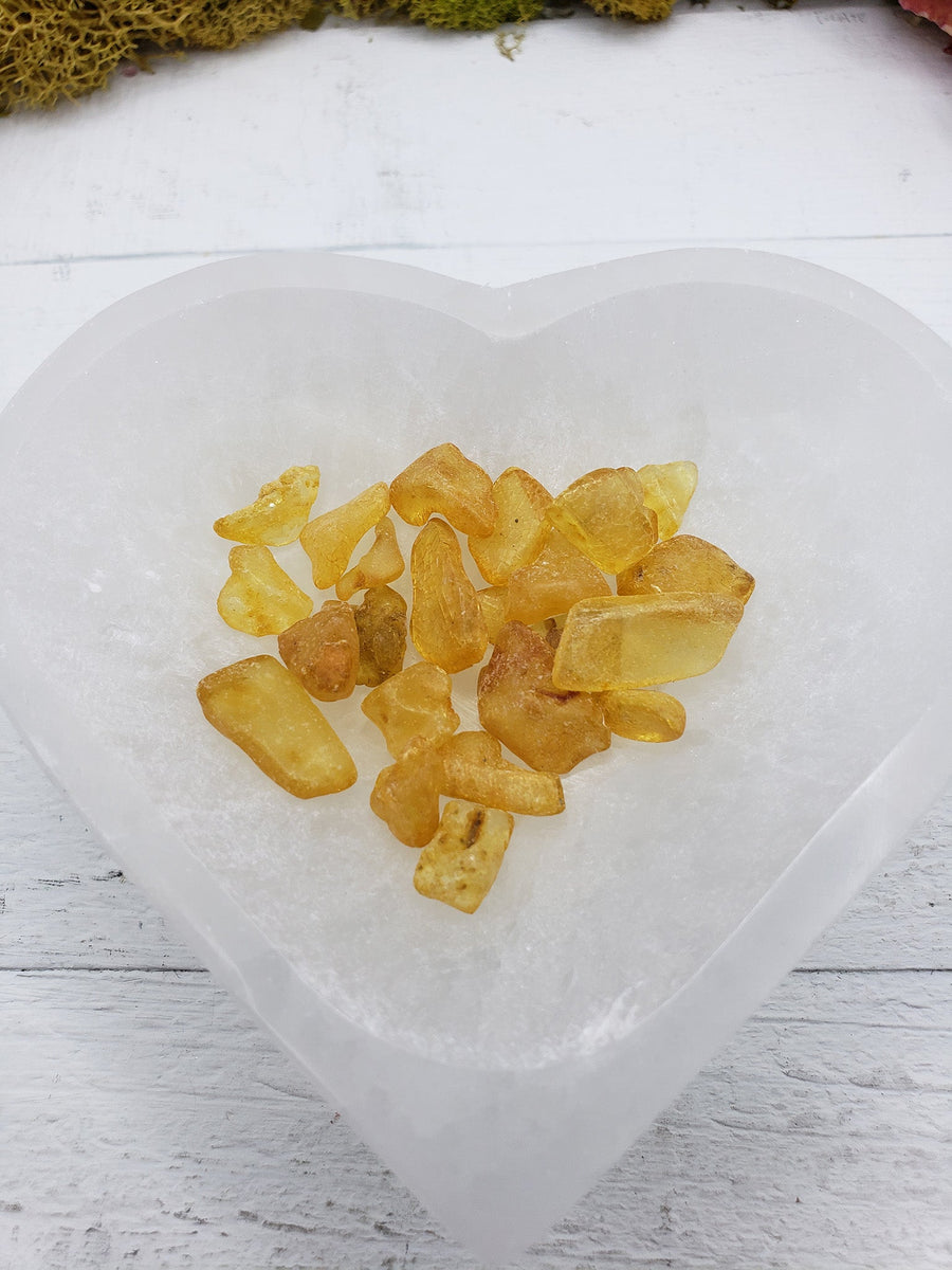 six grams of amber crystal chips in selenite bowl