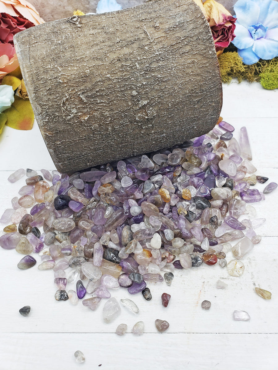 cacoxenite crystal chips on log
