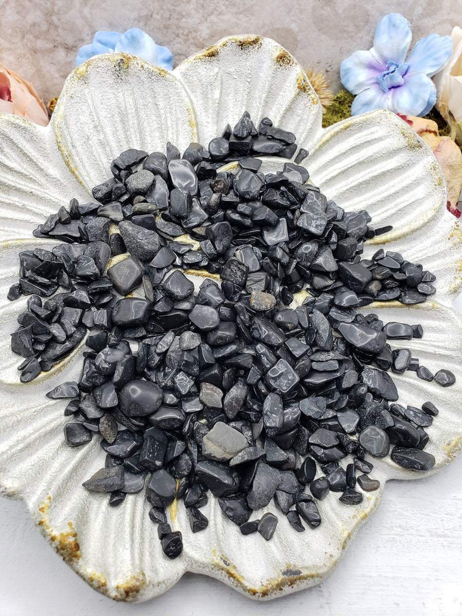 seven ounces of black tourmaline on floral dish display