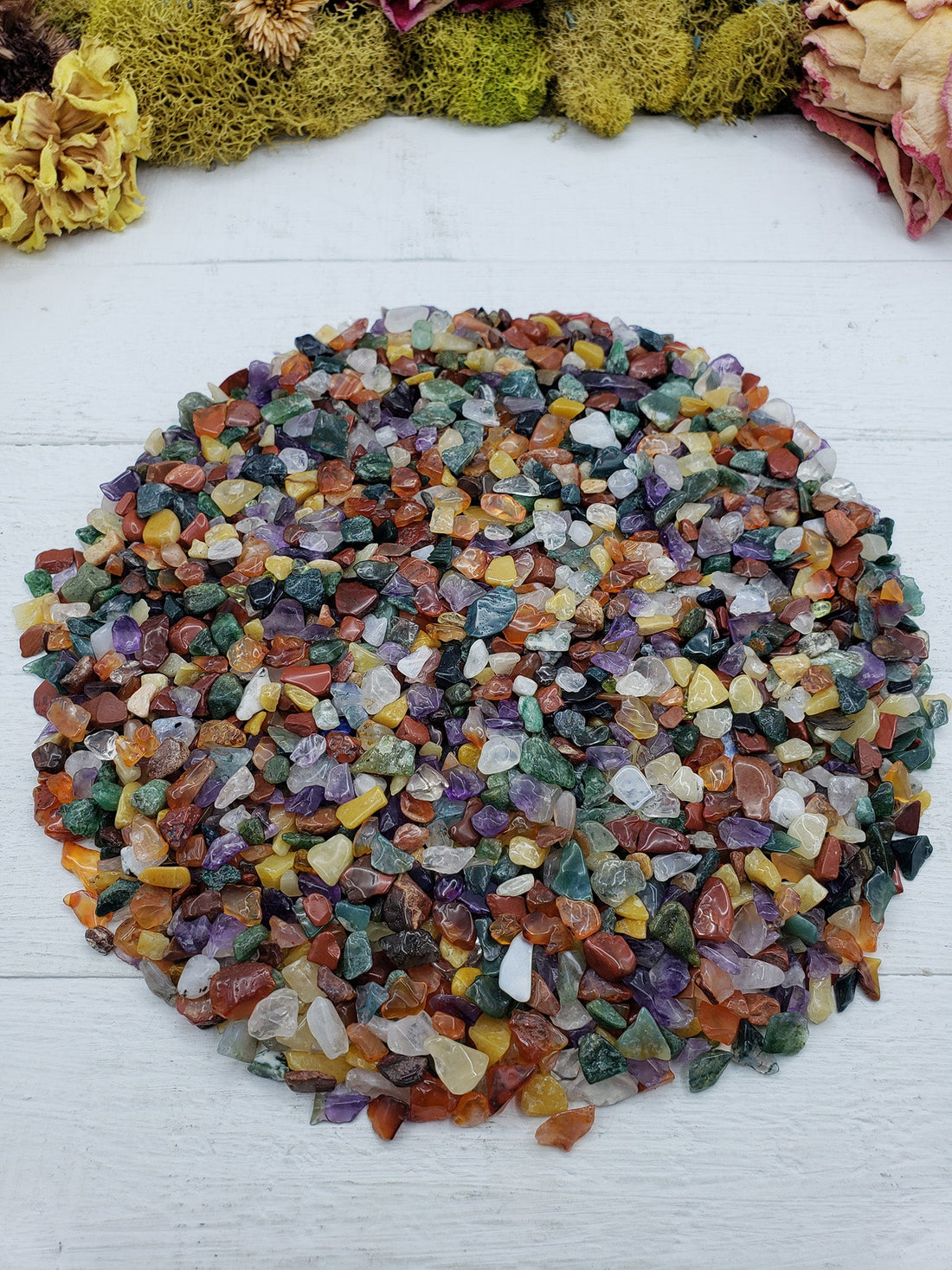 Eight ounces of mixed gemstone crystal chips on display