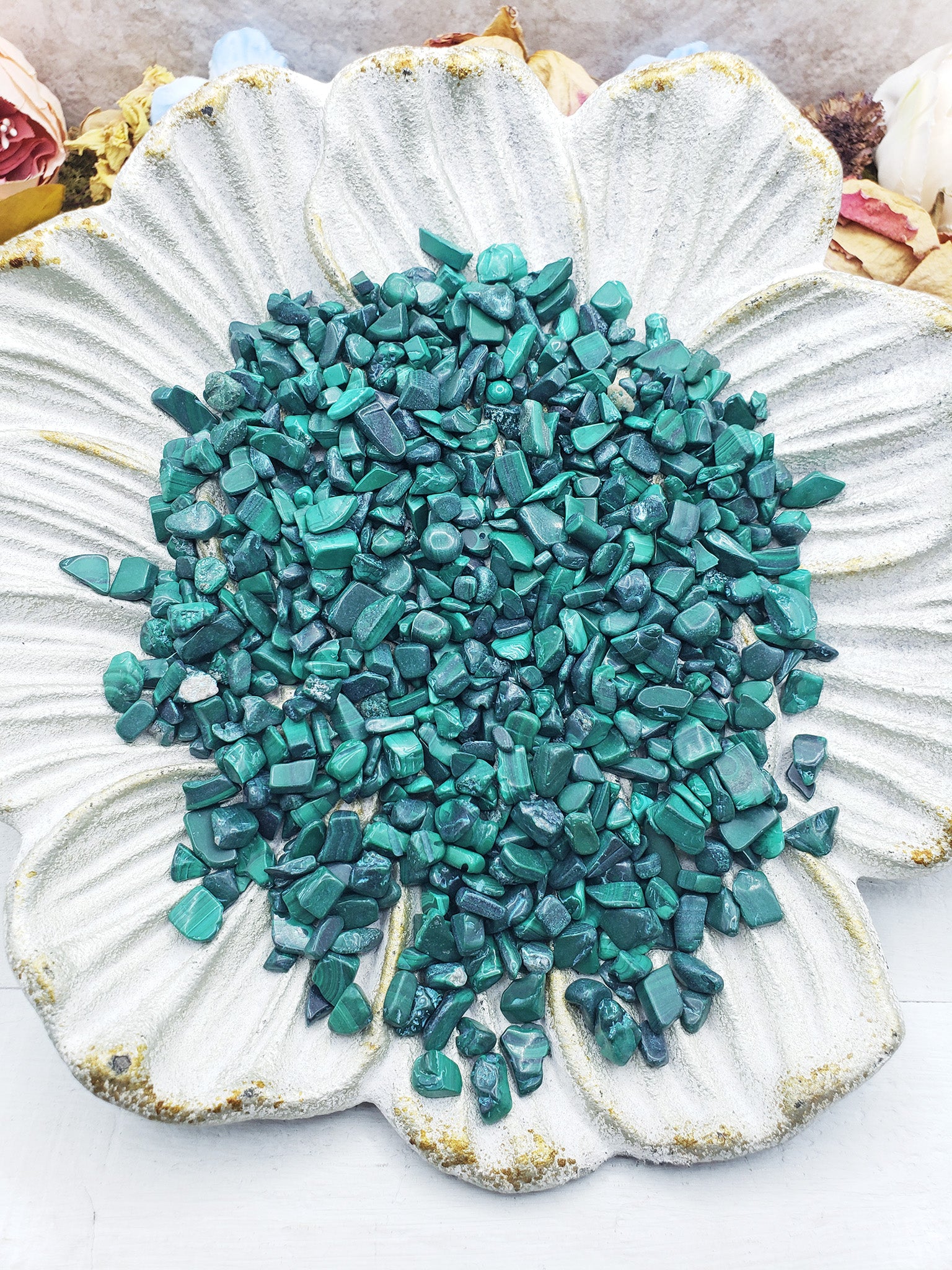 malachite crystal chips on flower dish