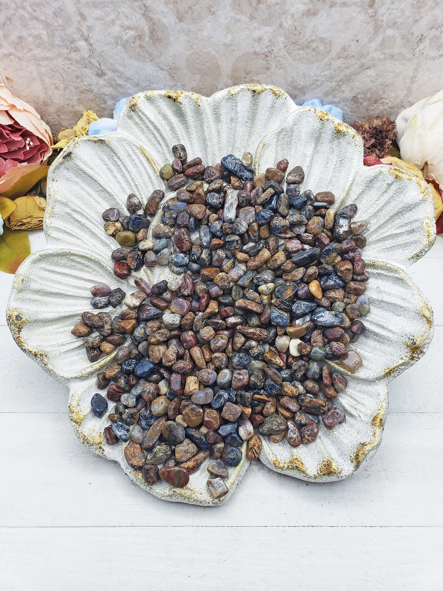 pietersite crystal chips on flower dish