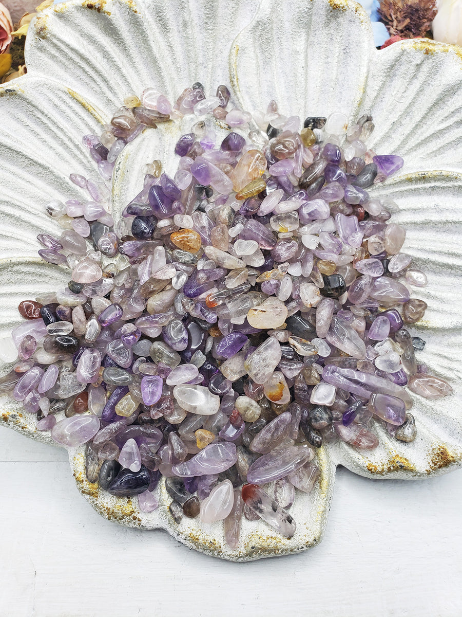 cacoxenite crystal chips on flower plate