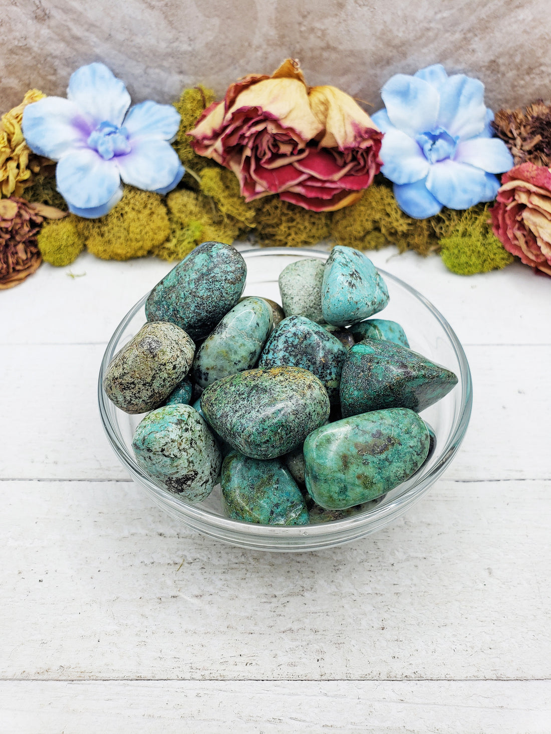 african turquoise stones in glass bowl
