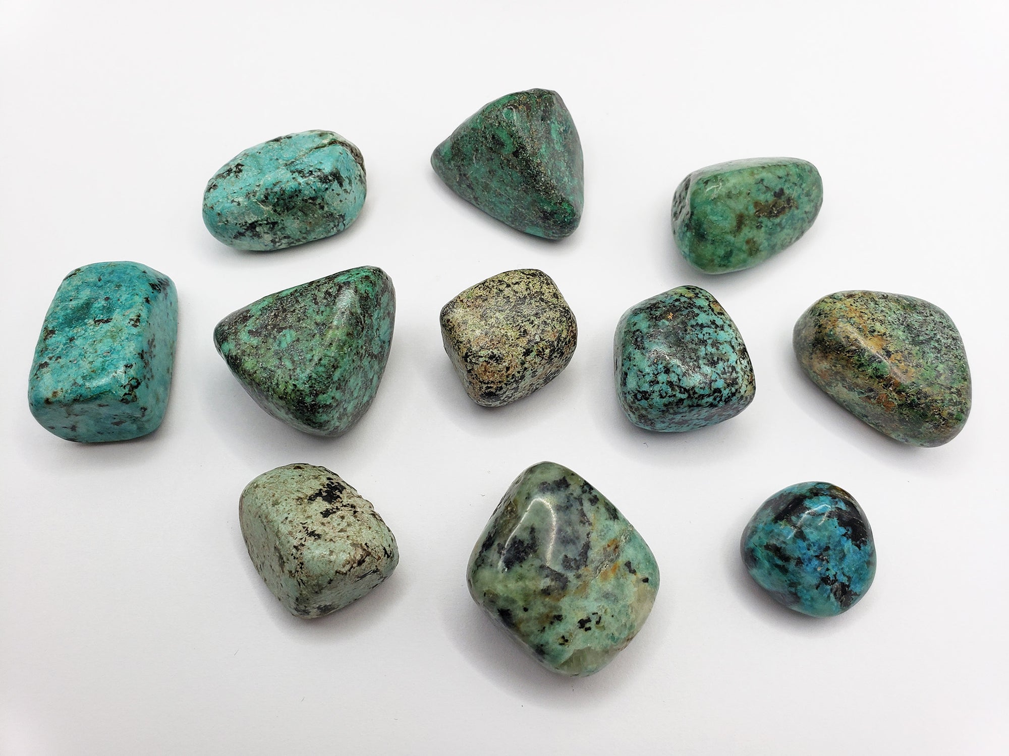 african turquoise stones on white background