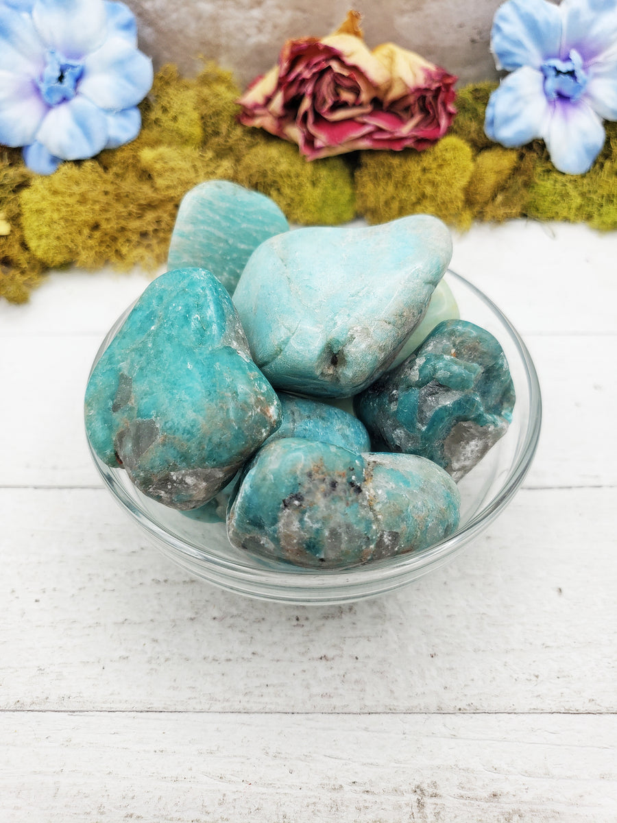 amazonite crystals in glass bowl