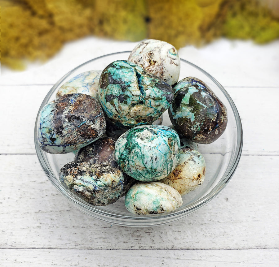 azurite malachite stones in glass bowl