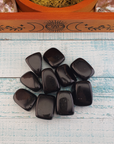 Black Obsidian Natural Tumbled Stone - One Stone - On Board