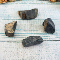 Four rough bloodstone crystal chunks on display