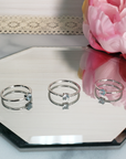 Blue Topaz Sterling Silver Ring - Ilonia - Three Blue Topaz Rings on Mirror
