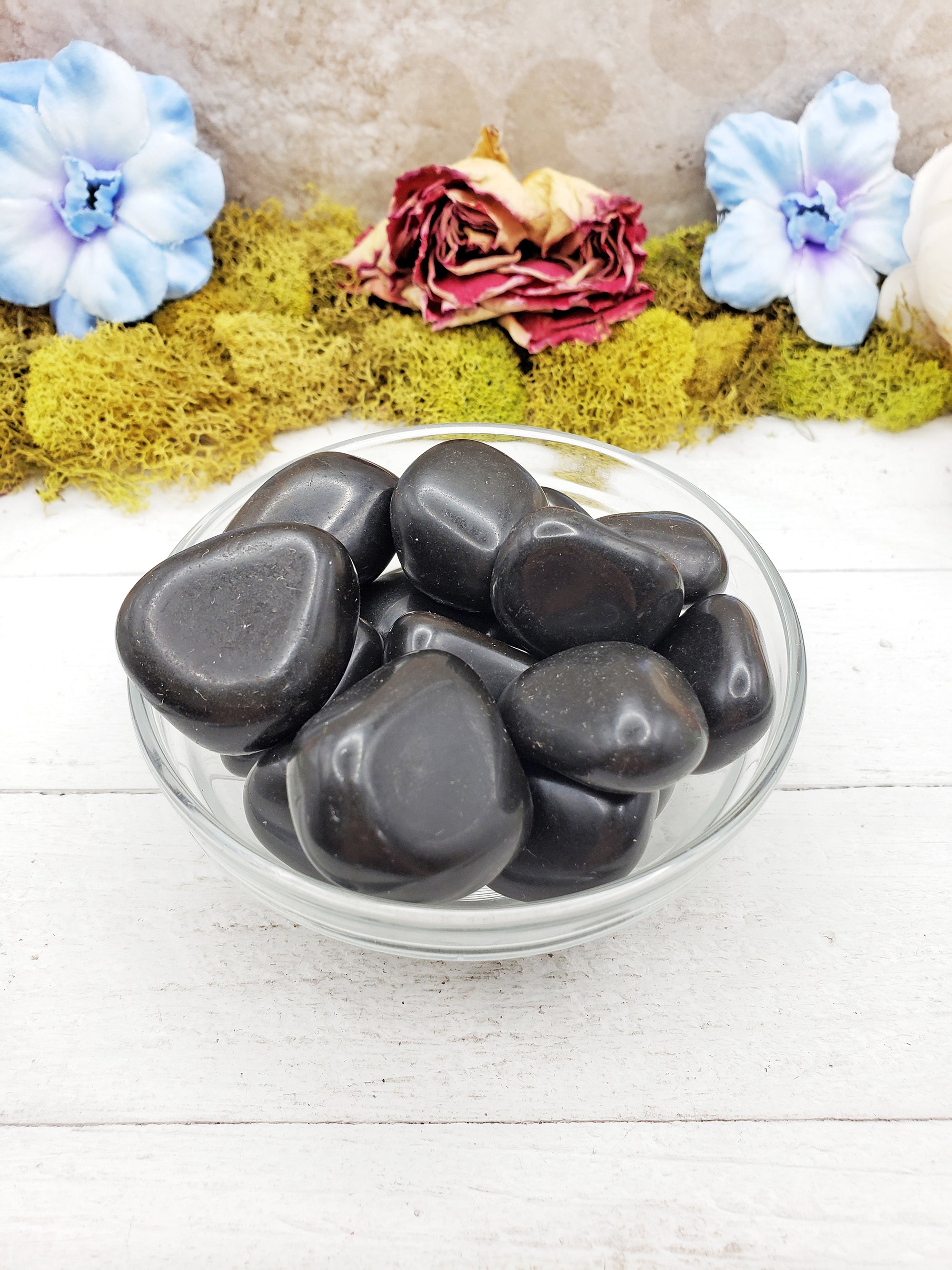 Black agate stones in bowl