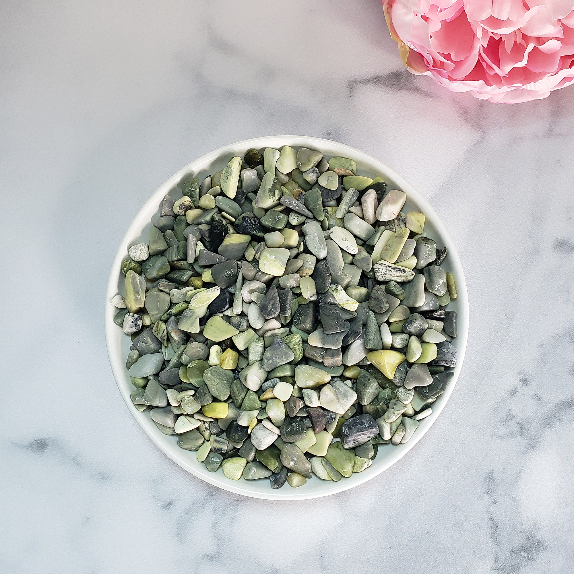 Infinite Serpentine Gemstone Chips By the Ounce - In White Ceramic Bowl, Crystal Chips Seen from Above