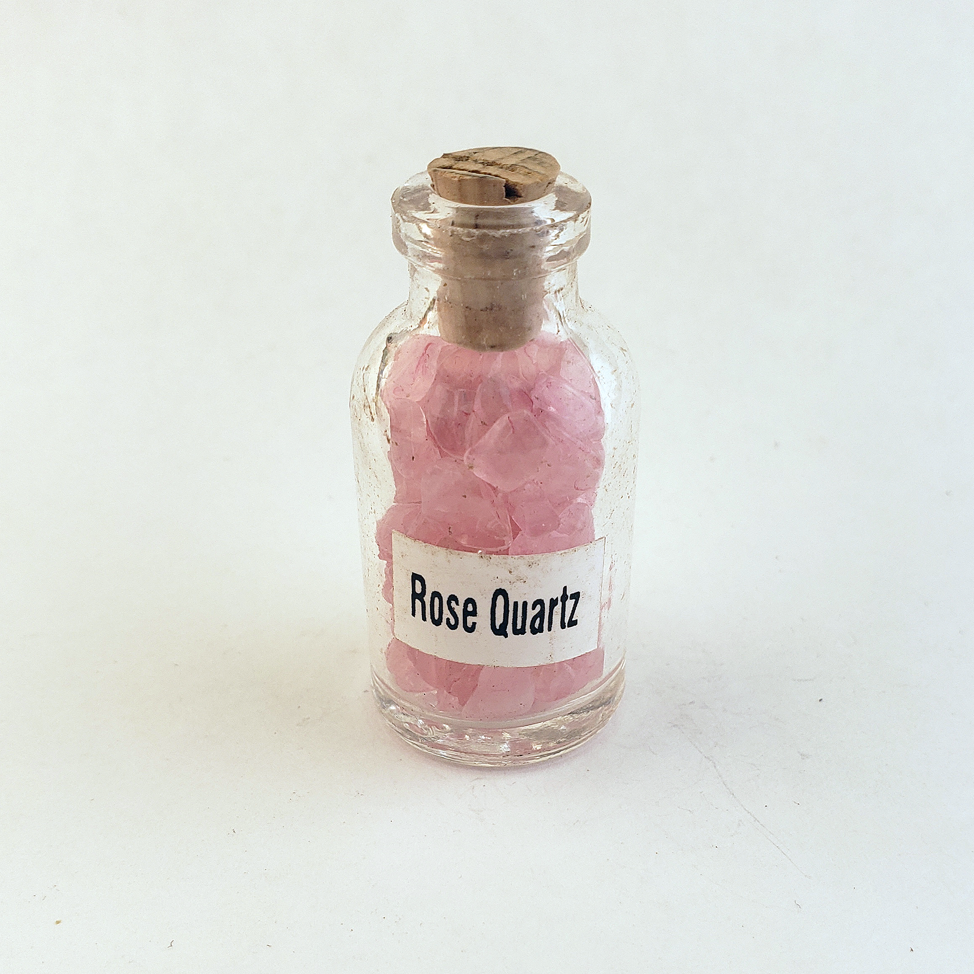 Rose Quartz Crystal Chips Chips in Glass Bottle | Color Enhanced