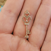 Crowned Key 10k Rose Gold White Diamond Pendant - In Hand