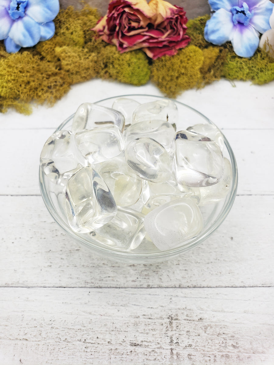 Clear obsidian stones in glass bowl