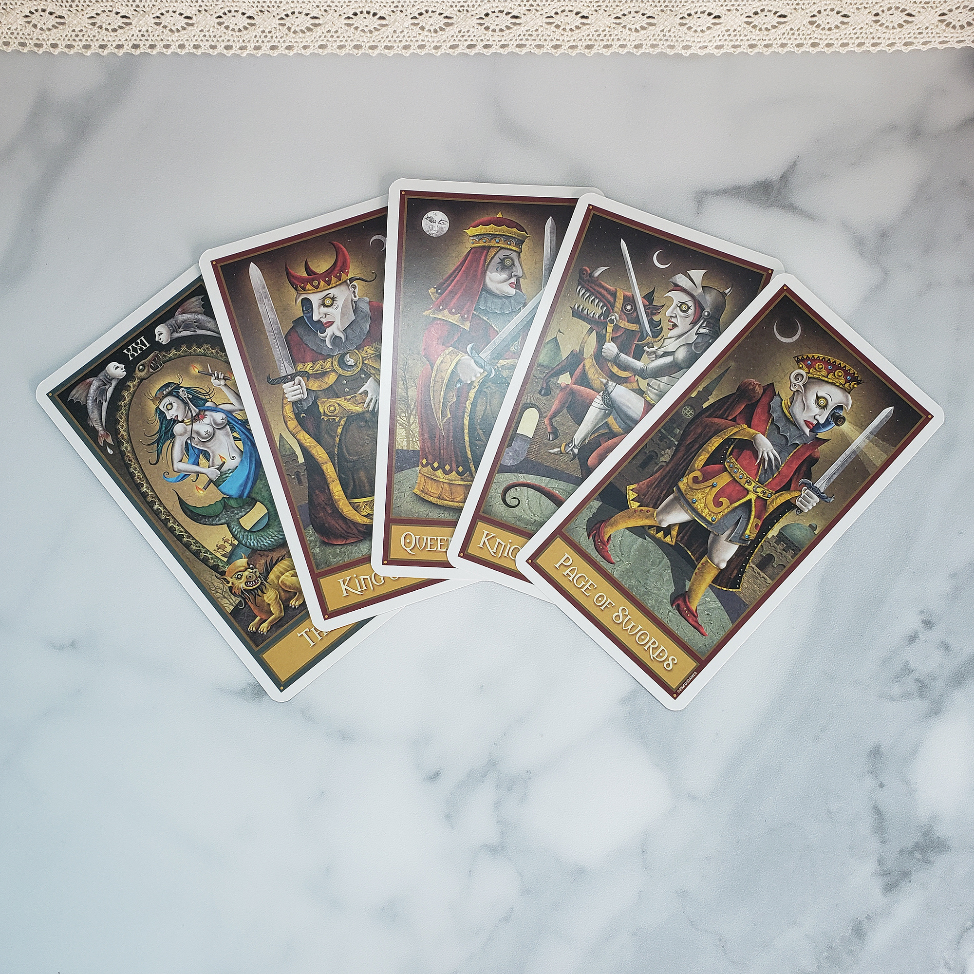 Deviant Moon Tarot Deck | Set of Tarot Cards | Divination Tool - The World and the Face Cards of Swords