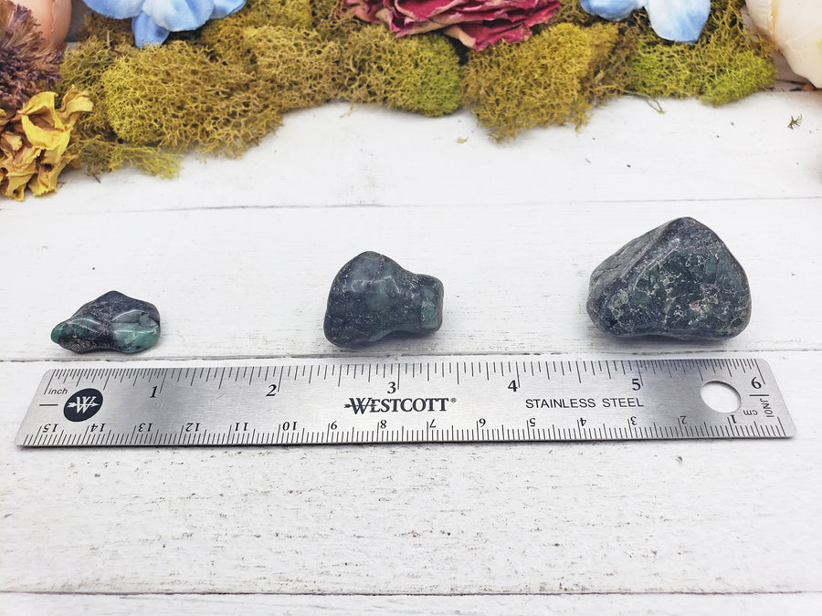 emerald in matrix stones on ruler