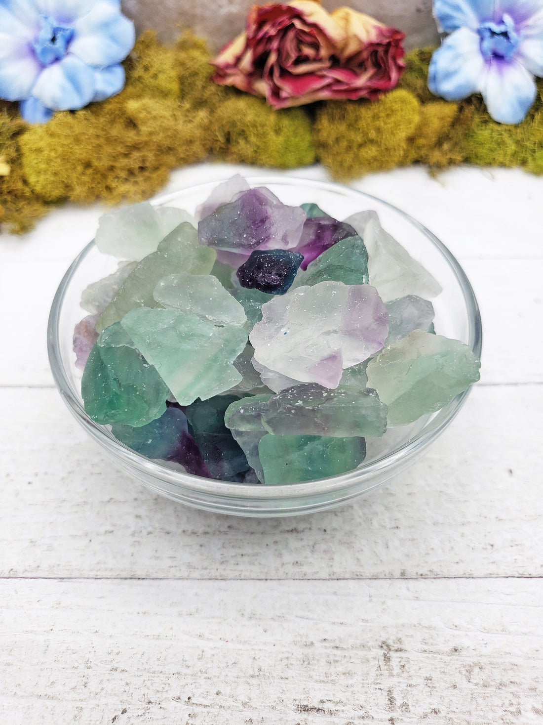 rough fluorite stones in glass bowl