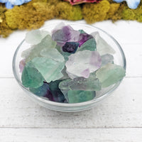 rough fluorite stones in glass bowl