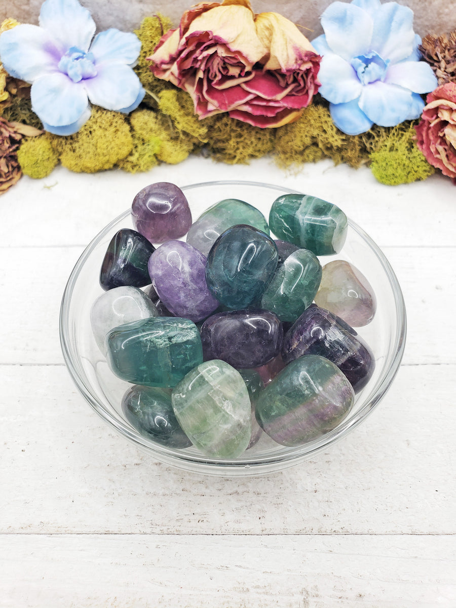 fluorite stones in glass bowl