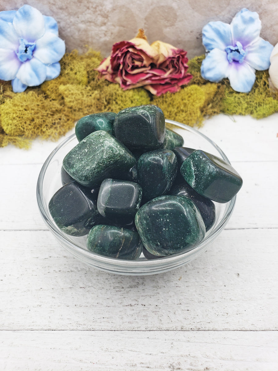 fuchsite crystals in glass bowl